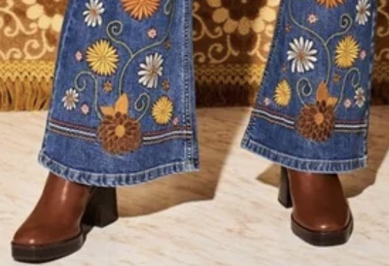 picture of bell bottom jeans with floral embroidery and boots